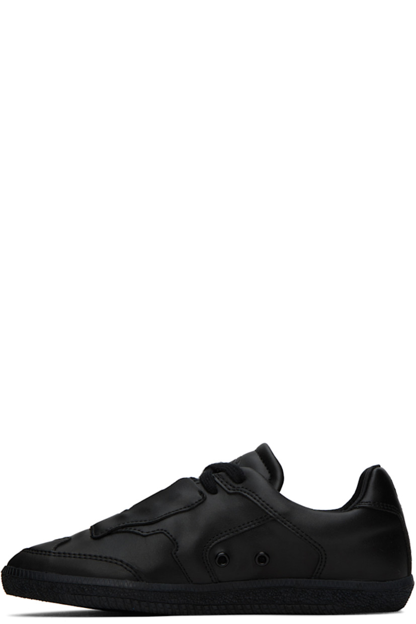 Handcrafted low-top grained faux-leather sneakers in black.

· Lace-up closure
· Logo embossed at padded tongue and heel
· Padded collar
· Rubberized logo patch at outer side
· Eyelets at inner side
· Grained leather lining
· Treaded TPU sole

Supplier color: Black beyond leather