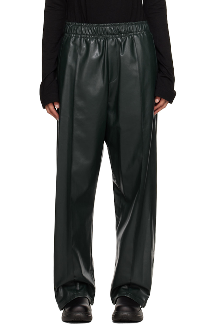 Faux-leather nylon lounge pants.

· Concealed drawstring at elasticized waistband
· Three-pocket styling
· Mock-fly
· Pinched seams at front and back
· Press-stud vents at cuffs
· Silver-tone logo plaque at back pocket

Supplier color: Fresh green