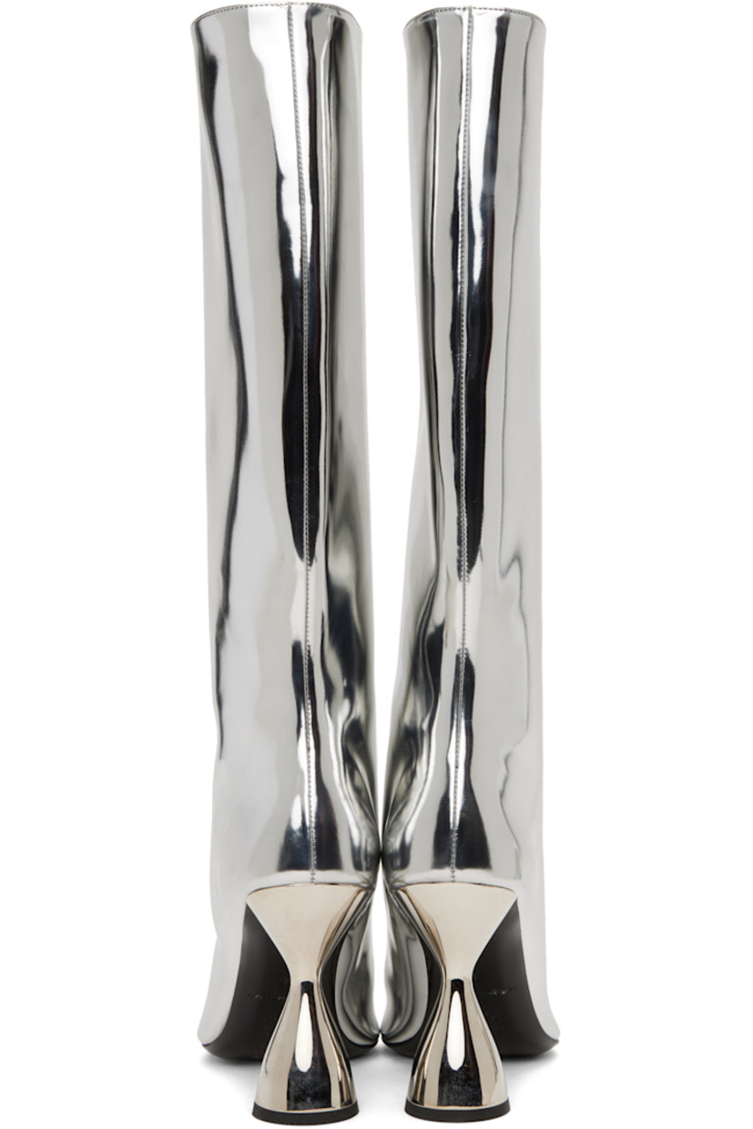 Knee-high patent faux-leather boots in metallic silver-tone.

· Pointed toe
· Grained leather lining
· Sculptural PVC heel with rubber injection
· Leather sole
· Heel: H3.75 in

Supplier color: Silver
