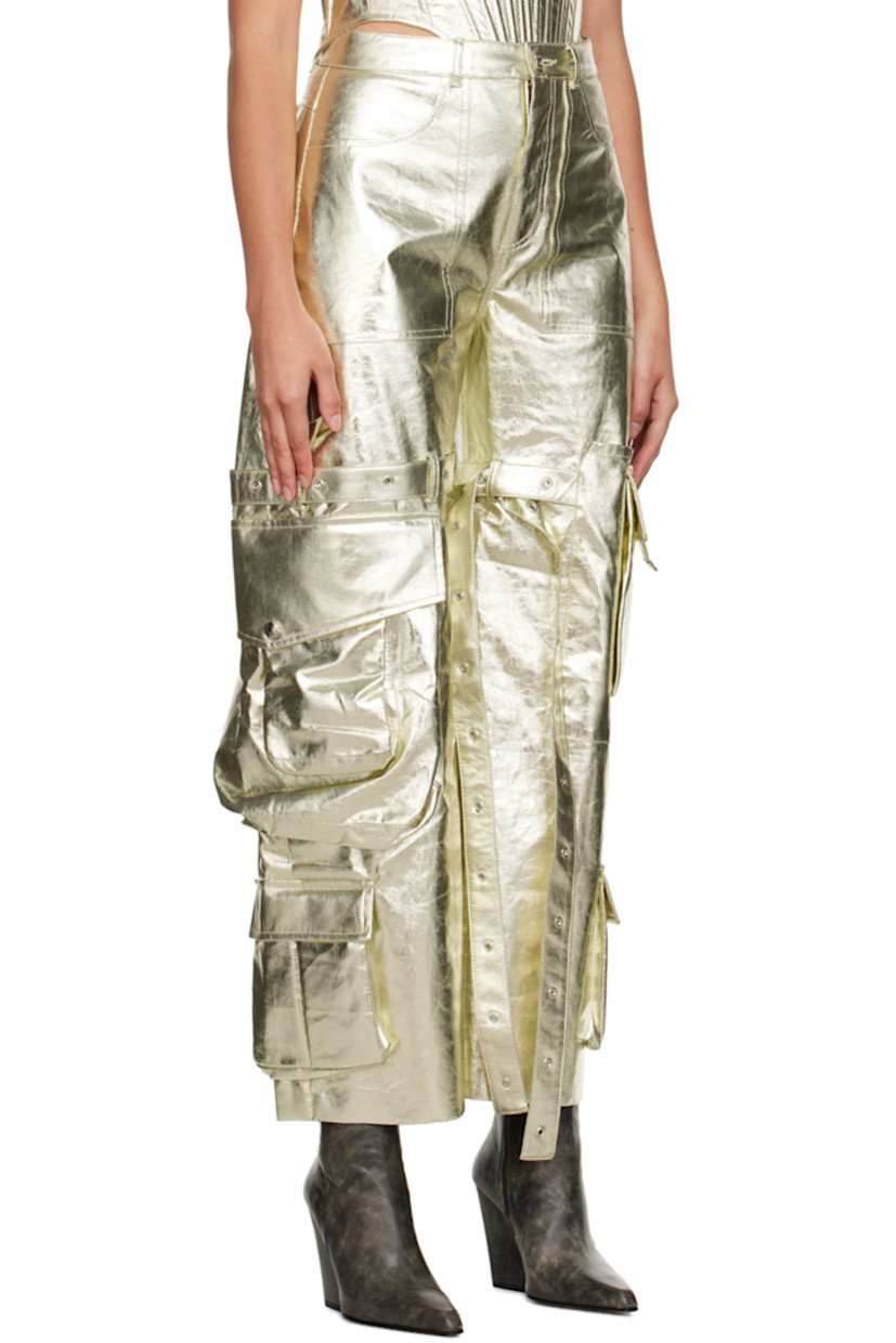 Wide-leg non-stretch coated denim jeans. Adjustable pin-buckle straps throughout. 

· Low-rise
· Belt loops
· Four-pocket styling
· Zip-fly
· Fraying at cuffs
· Flap pockets at outseams
  
Supplier color: Light gold
