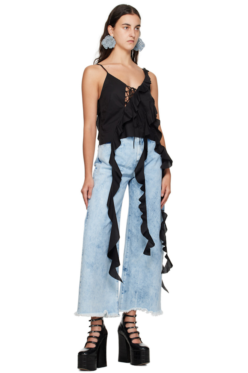 Cotton poplin tank top. Ruffled trim throughout.

· Adjustable spaghetti straps
· V-neck
· Self-tie fastening at front
· Extended trim at hem

Supplier color: Black