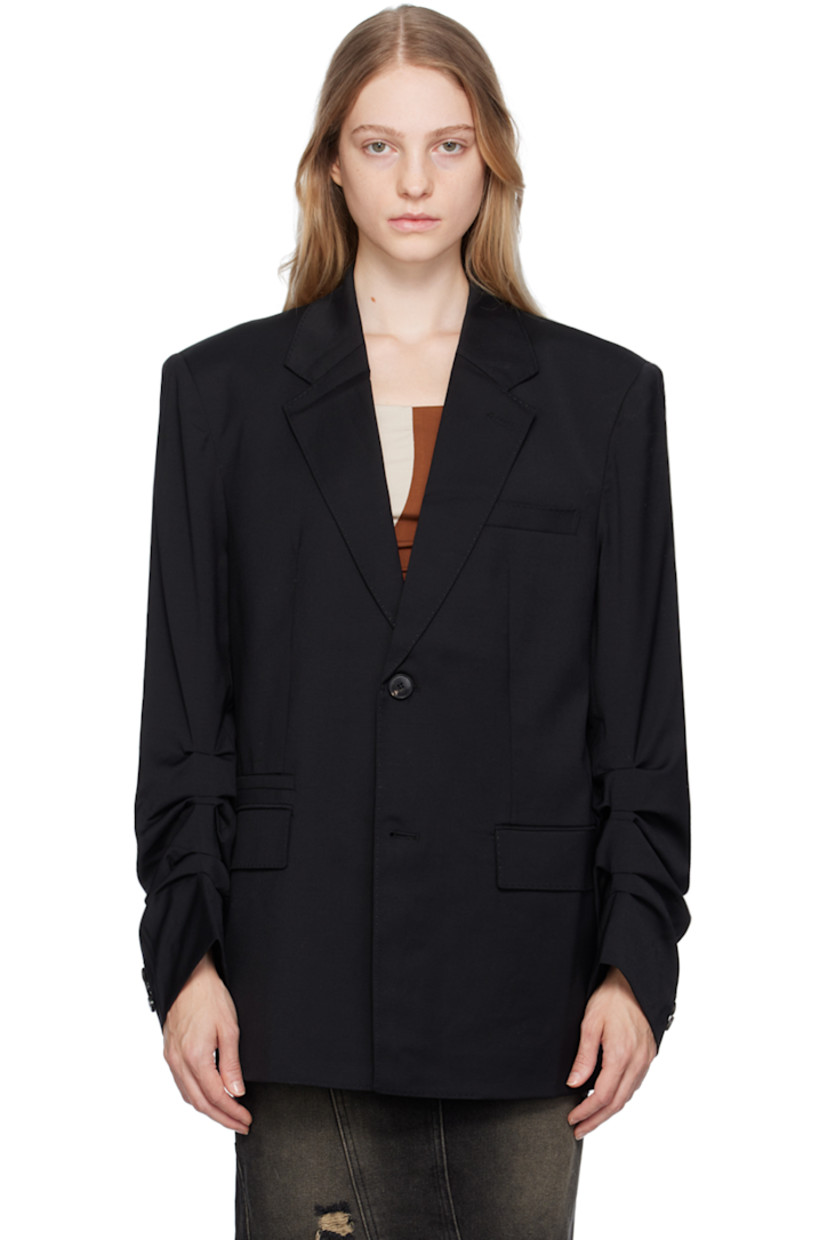 Stretch wool twill blazer.

· Notched lapel
· Two-button closure
· Welt pocket and flap pockets
· Padded shoulders
· Gathering at sleeves
· Three-button surgeon's cuffs
· Full satin lining 

Supplier color: Black