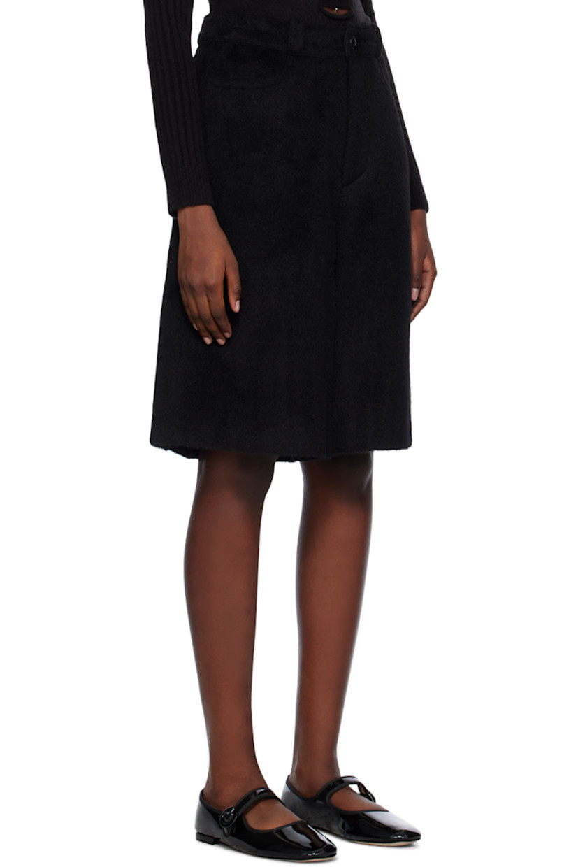 Shag knit llama- and wool-blend shorts. 

· Belt loops
· Three-pocket styling
· Zip-fly
· Partial satin lining

Supplier color: Black