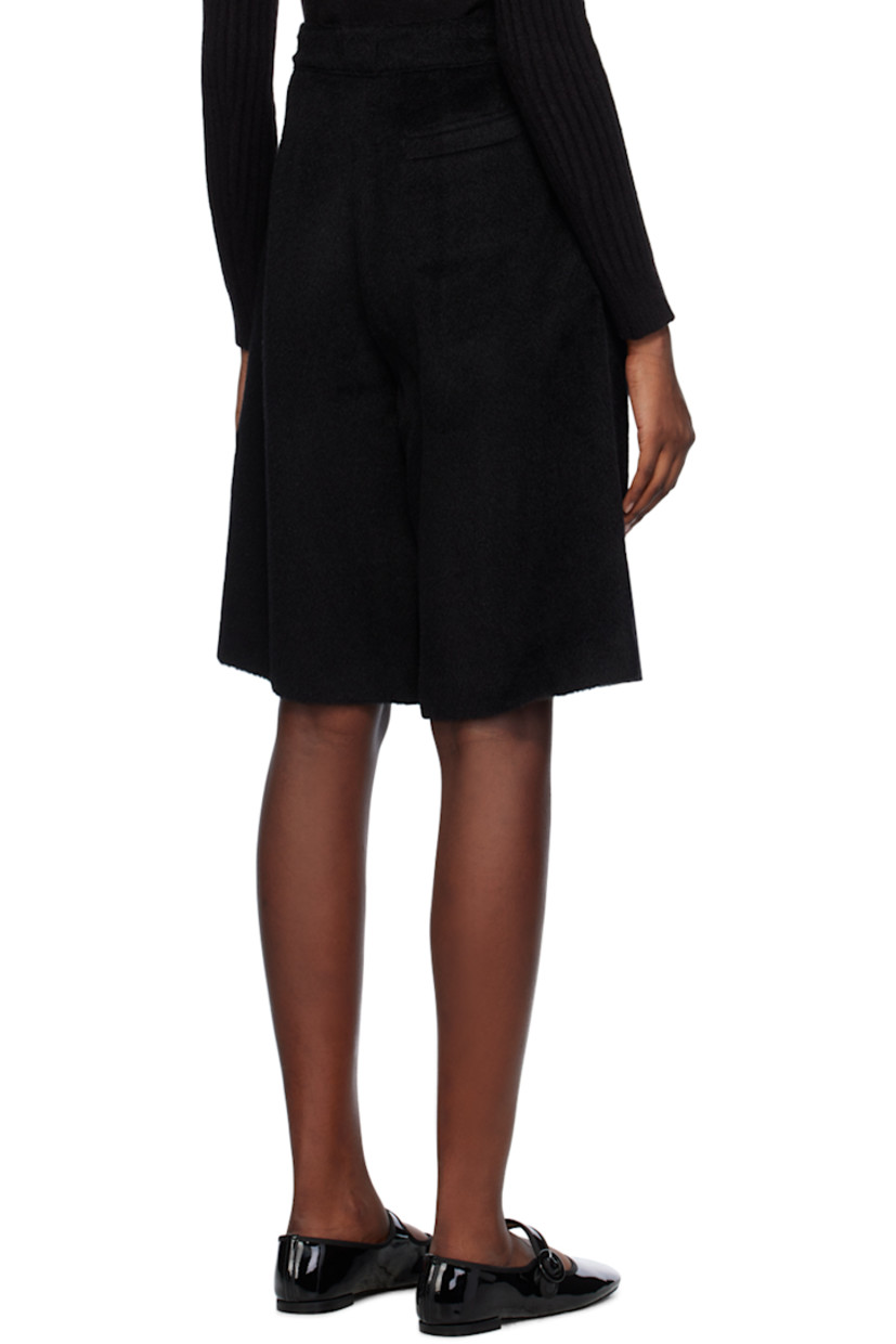Shag knit llama- and wool-blend shorts. 

· Belt loops
· Three-pocket styling
· Zip-fly
· Partial satin lining

Supplier color: Black