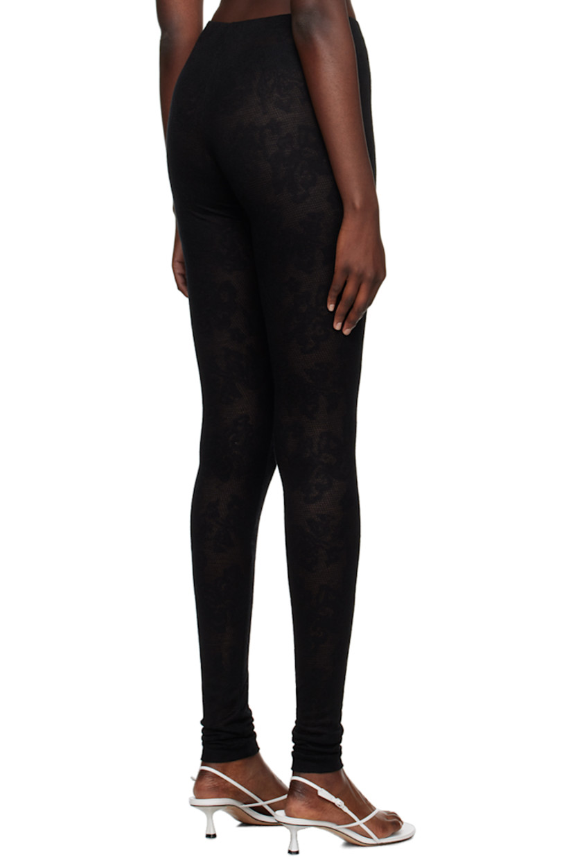 Semi-sheer viscose- and lyocell-blend lace leggings. 

· Jacquard floral pattern throughout
· Elasticized waistband

Supplier color: Black