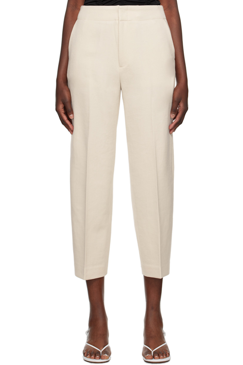 Virgin wool twill trousers.

· Belt loops
· Four-pocket styling
· Zip-fly
· Central crease at front legs
· Cropped cuffs

Supplier color: Cream