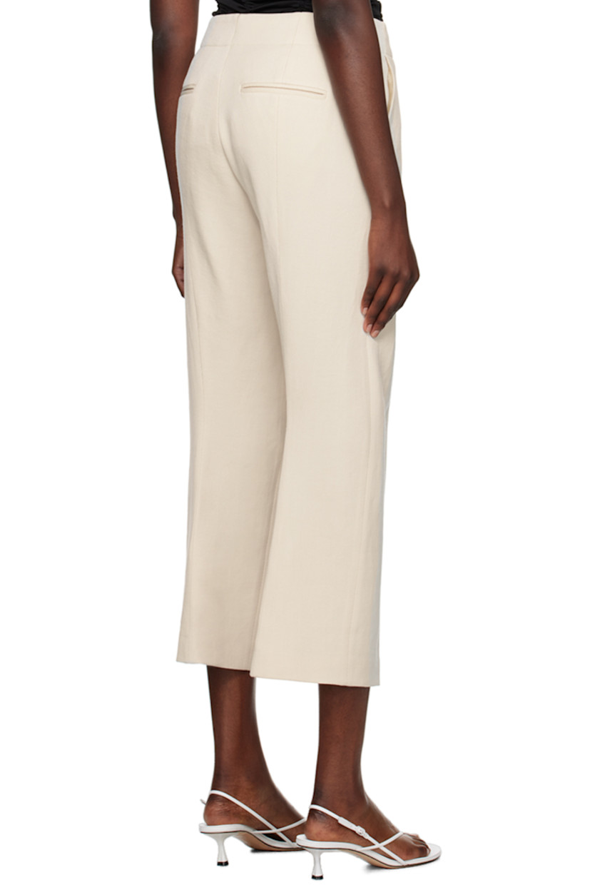 Virgin wool twill trousers.

· Belt loops
· Four-pocket styling
· Zip-fly
· Central crease at front legs
· Cropped cuffs

Supplier color: Cream