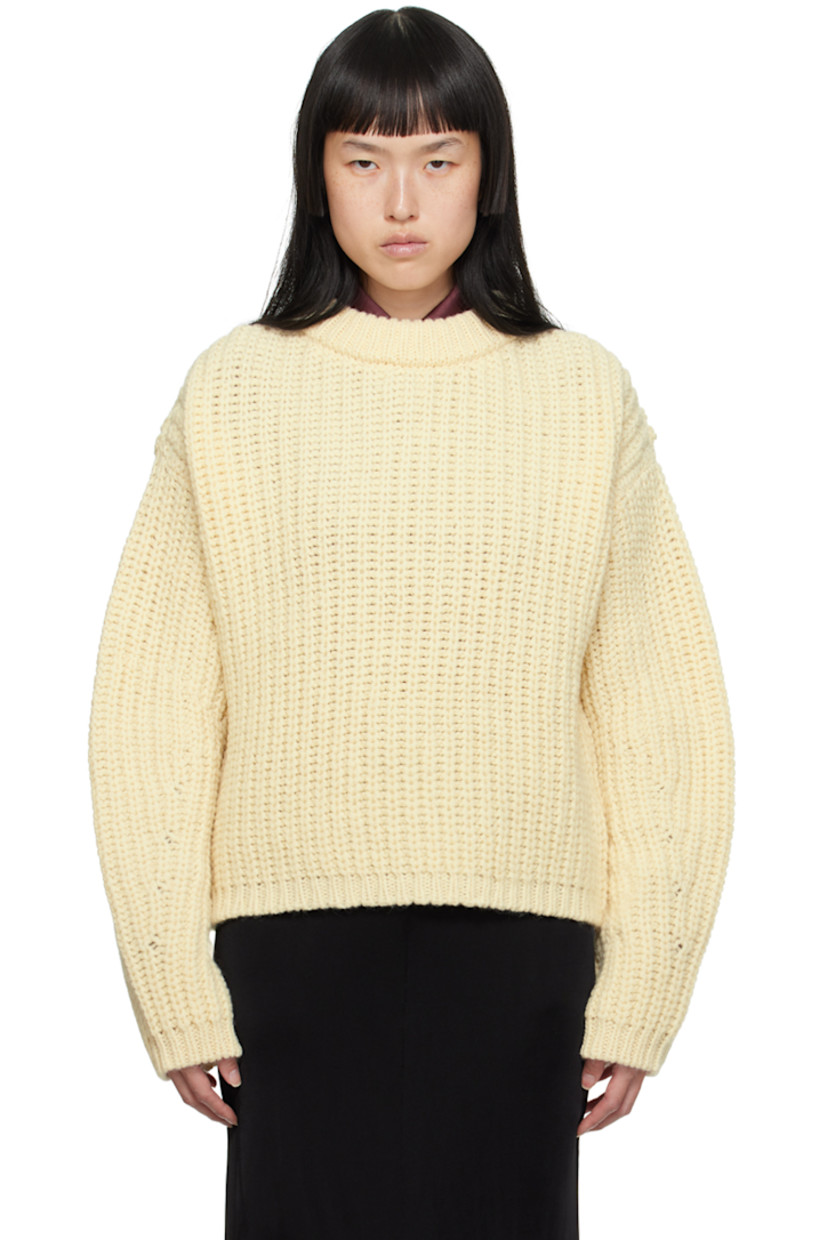 Rib knit virgin wool sweater.

· Crewneck
· Dropped shoulders

Supplier color: Cream