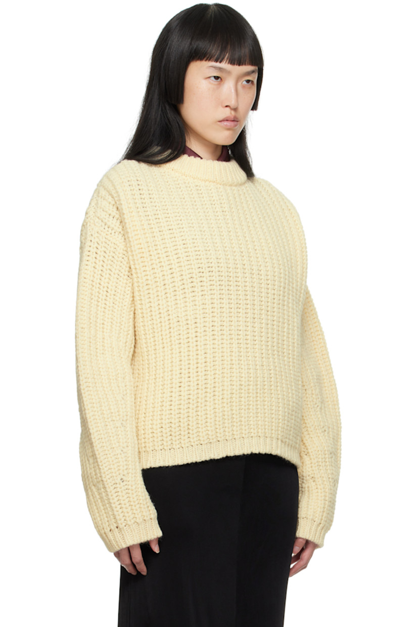 Rib knit virgin wool sweater.

· Crewneck
· Dropped shoulders

Supplier color: Cream