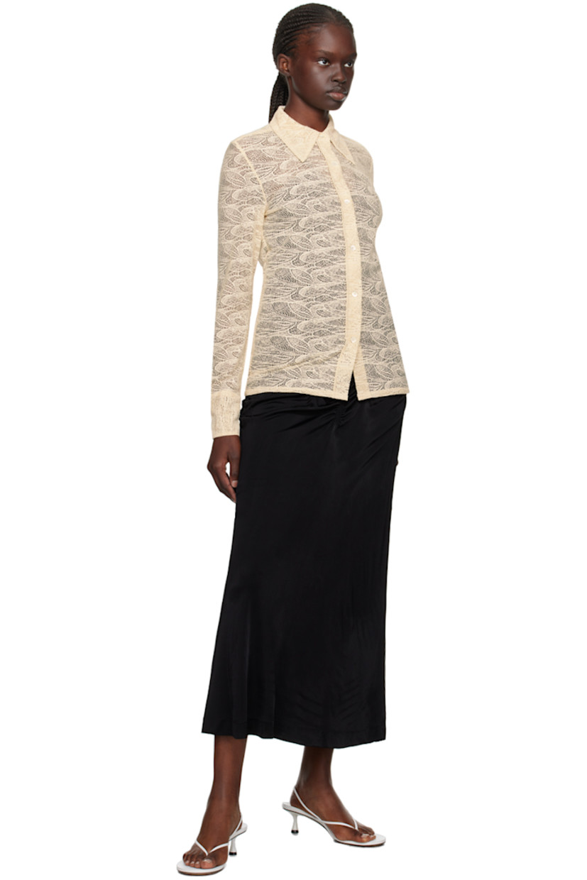 Stretch nylon lace shirt.

· Spread collar
· Button closure
· Single-button barrel cuffs

Supplier color: Off-white
