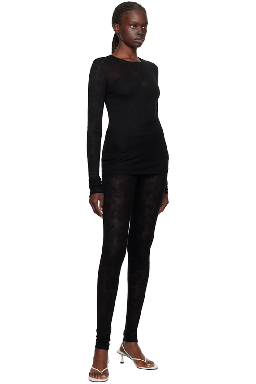 Semi-sheer viscose- and lyocell-blend lace T-shirt. 

· Jacquard floral pattern throughout
· Crewneck

Supplier color: Black