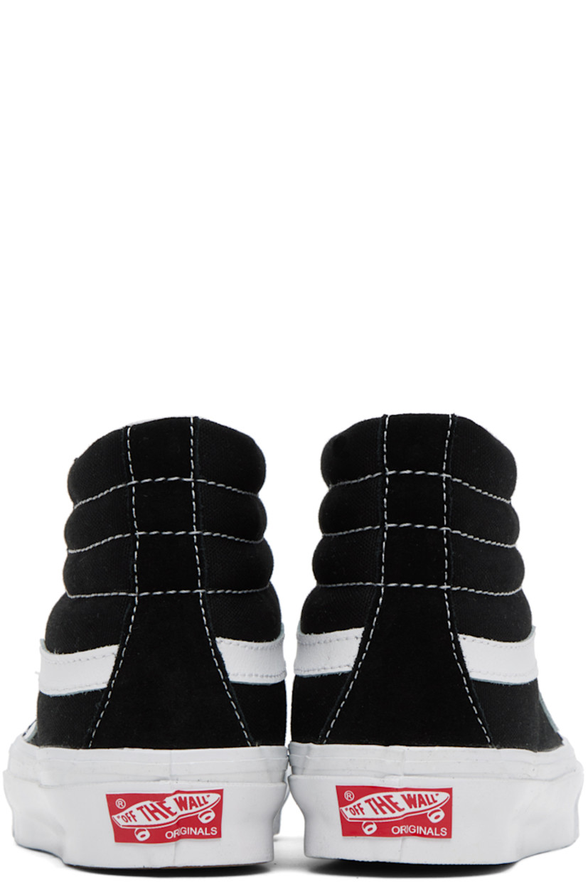 High-top paneled canvas and suede sneakers in black. Grained leather signature stripe in white at sides. 

· Lace-up closure
· Padded quilted collar
· Buffed leather lining
· Rubberized logo patch at heel
· Treaded rubber sole
· Contrast stitching in white

Supplier color: Black/Black/White
