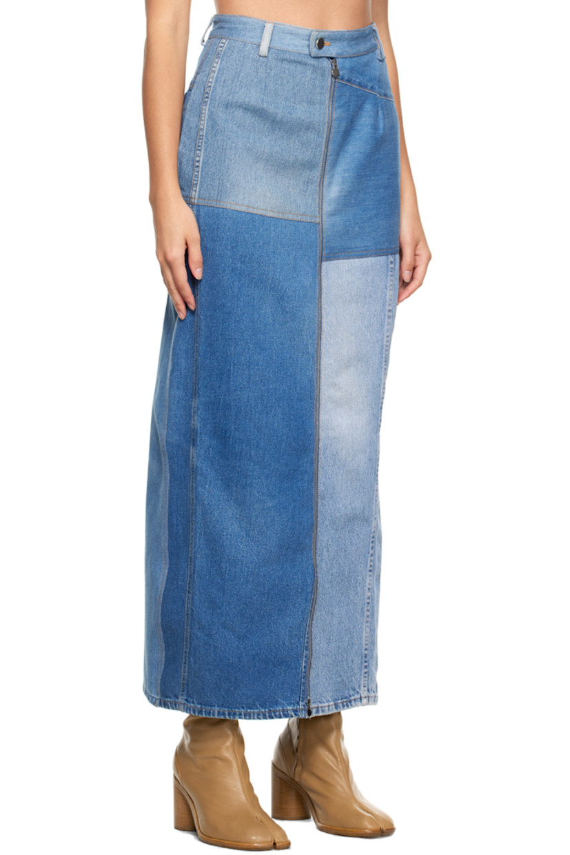 Non-stretch denim skirt. Fading throughout.

· Paneled construction
· Belt loops
· Four-pocket styling
· Zip closure at front and back 
· Contrast stitching in tan

Supplier color: Blue