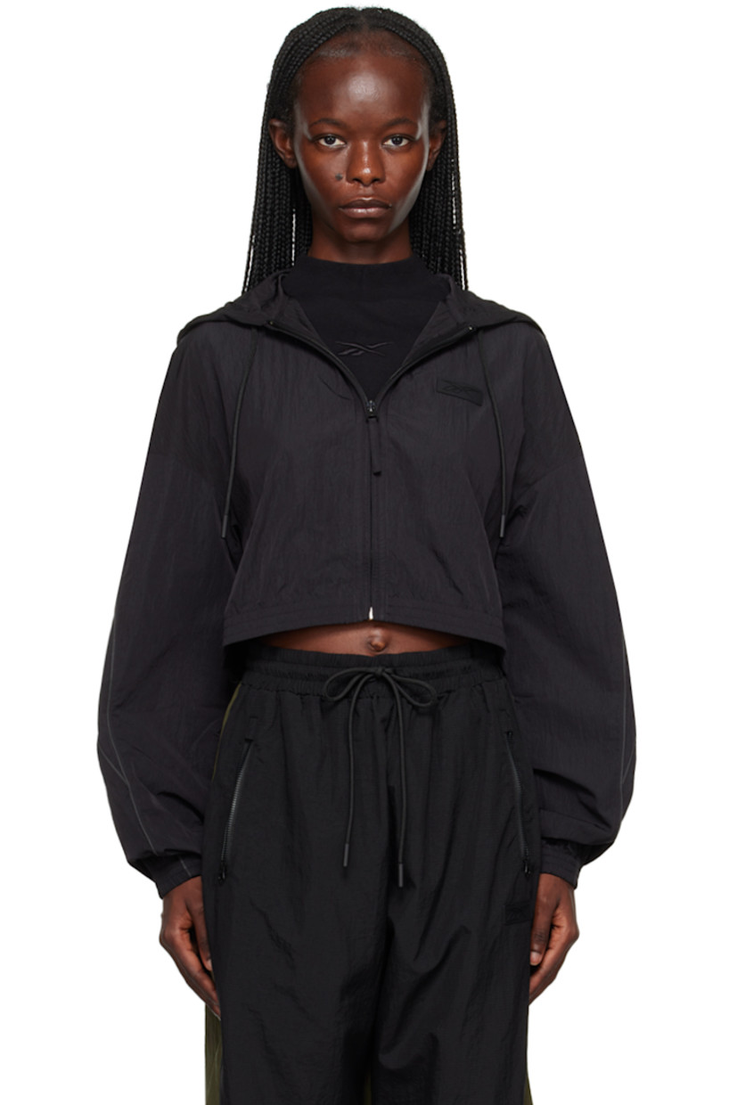 Nylon taffeta jacket.

· Drawstring at hood
· Zip closure
· Rubberized logo patch at chest
· Elasticized cropped hem and cuffs
· Piping at sleeves 
· Zip pocket at back 
· Unlined  

Supplier color: Black