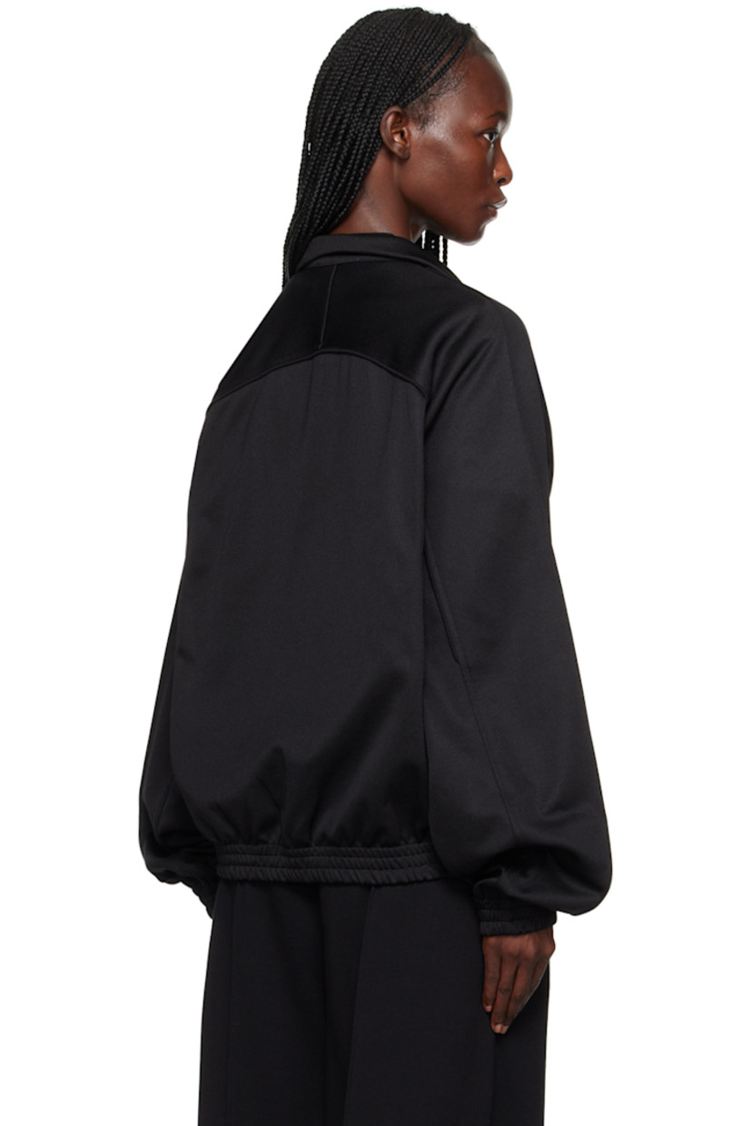 Polyester- and cotton-blend piqué jacket. Piping throughout. 

· Stand collar
· Zip closure
· Logo embroidered at chest
· Zip pockets
· Elasticized hem and cuffs 
· Raglan sleeves 

Supplier color: Black