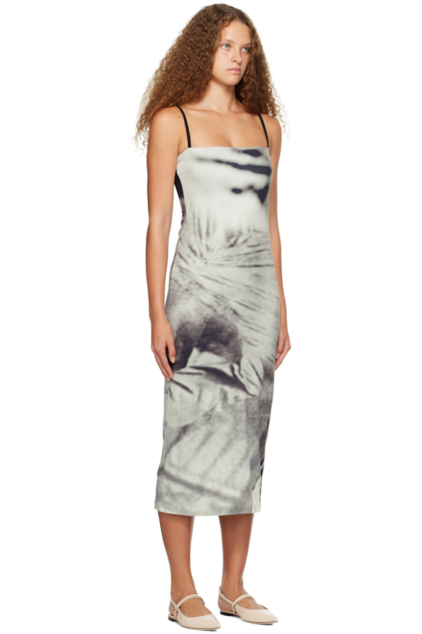 Stretch recycled polyester-blend jersey dress. Graphic printed throughout.

· Square neck 
· Elasticized shoulder straps
· Partially lined 

Supplier color: Print multi