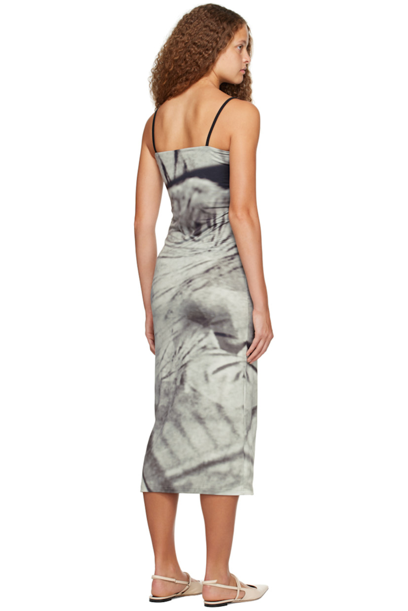 Stretch recycled polyester-blend jersey dress. Graphic printed throughout.

· Square neck 
· Elasticized shoulder straps
· Partially lined 

Supplier color: Print multi
