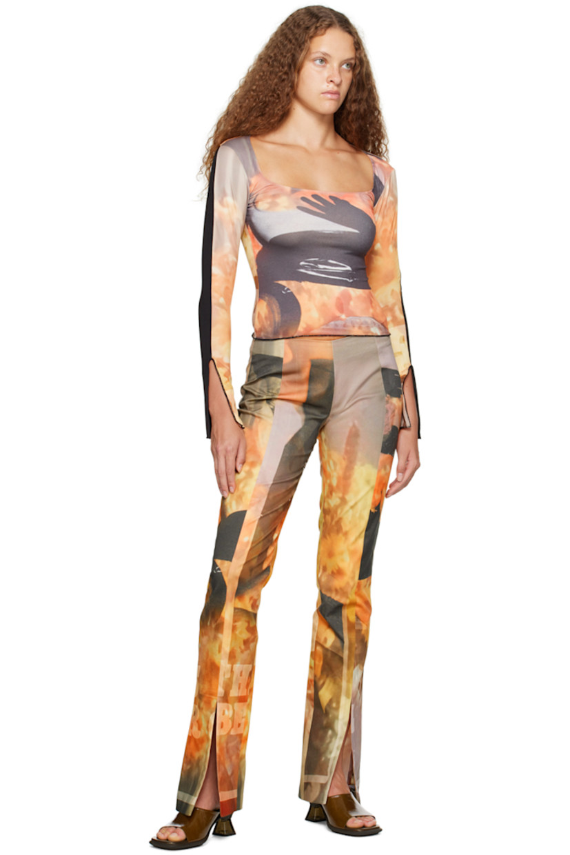 Stretch BCI-certified organic cotton-blend denim jeans. Graphic throughout. 

· Slit at cuffs 
· Concealed zip closure at side seam

Supplier color: Print multi