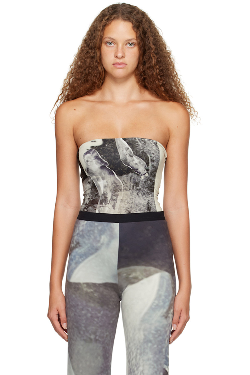 ECOVERO™-certified stretch viscose jersey bodysuit. Graphics printed throughout. 

· Straight neck 
· Adjustable press-stud fastening at bottom 

Supplier color: Print multi