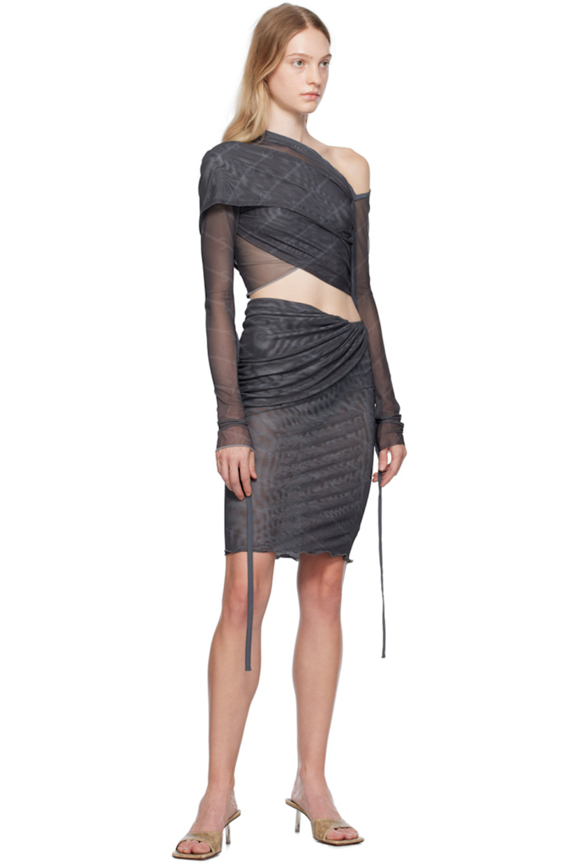 Semi-sheer stretch polyester mesh skirt. Draping, ruching, and printed logo pattern  throughout.

· Layered and wrap construction
· Lettuce edge at hem 

Supplier color: Logo gray