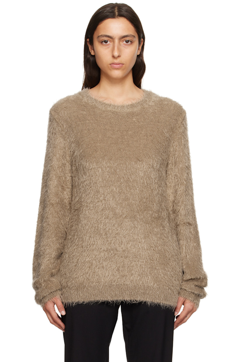 Shag knit nylon sweater. 

· Rib knit crewneck, hem, and cuffs
· Logo hardware at hem

Supplier color: Tan