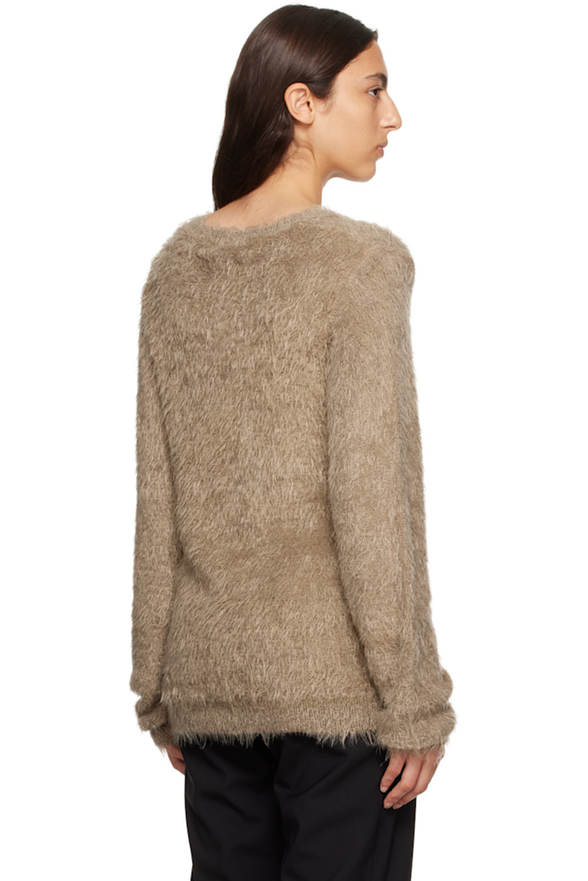 Shag knit nylon sweater. 

· Rib knit crewneck, hem, and cuffs
· Logo hardware at hem

Supplier color: Tan