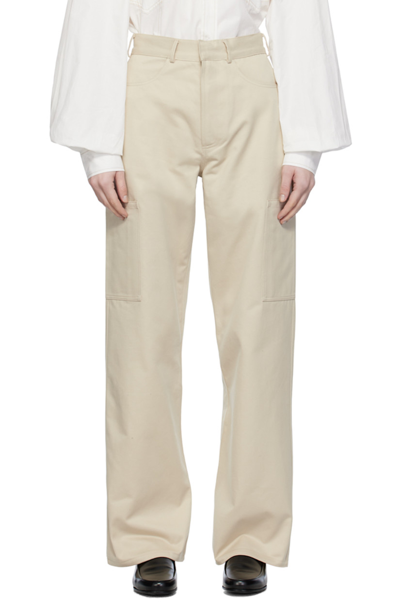 Cotton twill trousers.

· Belt loops
· Four-pocket styling
· Zip-fly
· Patch pocket at outseams
�· Hammer loop at outseam

Supplier color: Cream