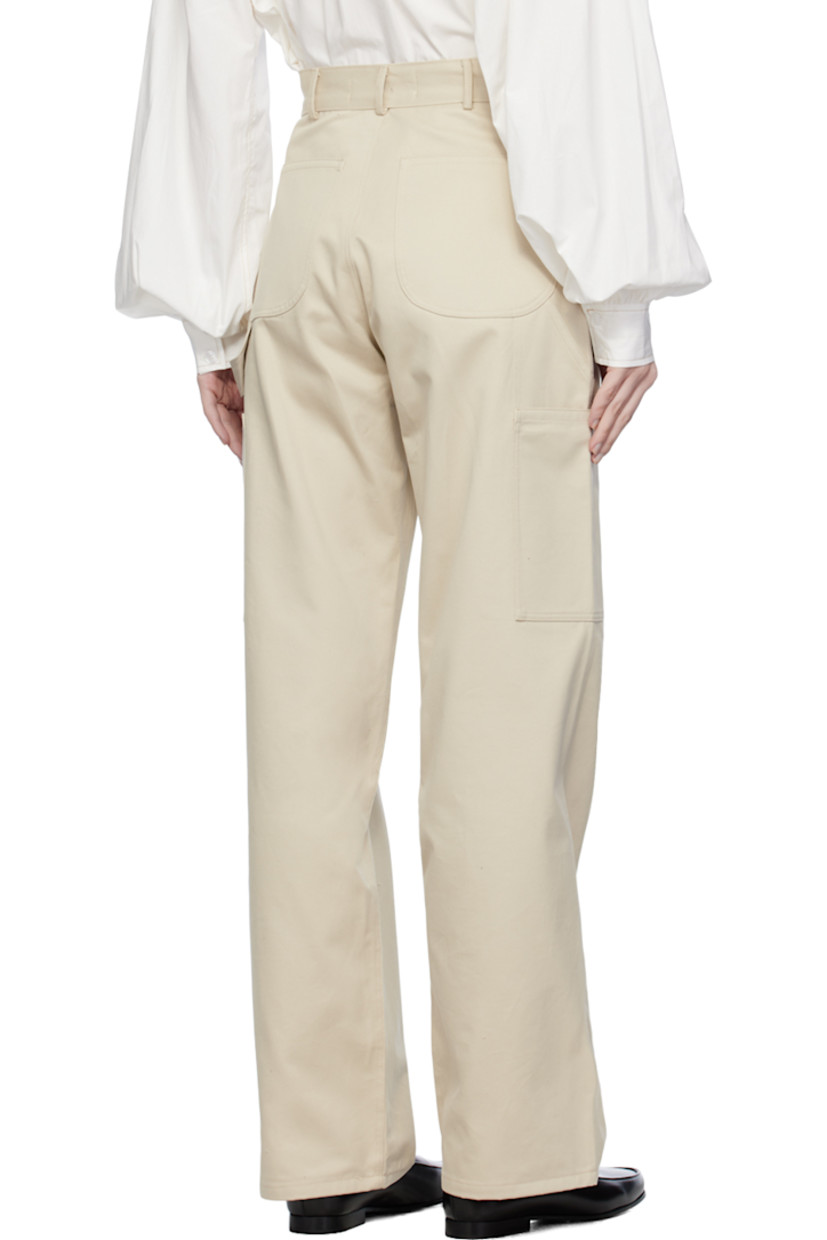 Cotton twill trousers.

· Belt loops
· Four-pocket styling
· Zip-fly
· Patch pocket at outseams
· Hammer loop at outseam

Supplier color: Cream