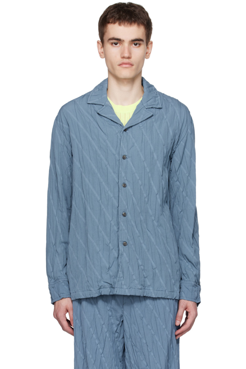 Garment-pleated plain-woven cotton-blend shirt. Jacquard stripes throughout.

· Open spread collar
· Button closure
· Adjustable single-button barrel cuffs

Supplier color: Blue