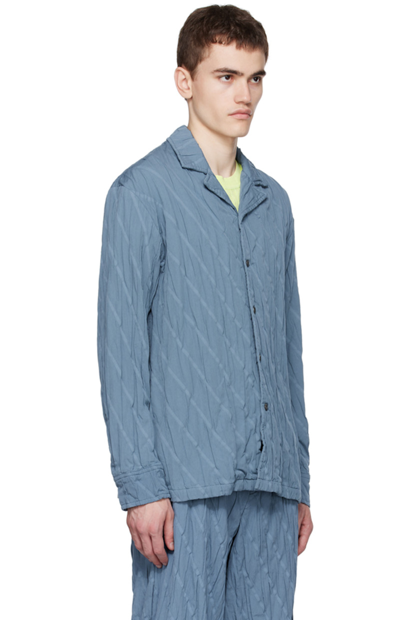 Garment-pleated plain-woven cotton-blend shirt. Jacquard stripes throughout.

· Open spread collar
· Button closure
· Adjustable single-button barrel cuffs

Supplier color: Blue