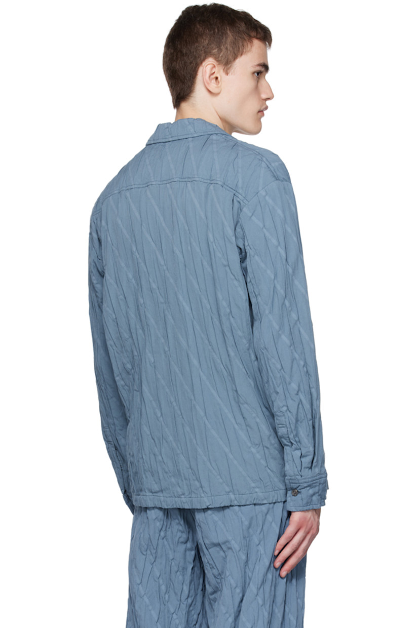 Garment-pleated plain-woven cotton-blend shirt. Jacquard stripes throughout.

· Open spread collar
· Button closure
· Adjustable single-button barrel cuffs

Supplier color: Blue