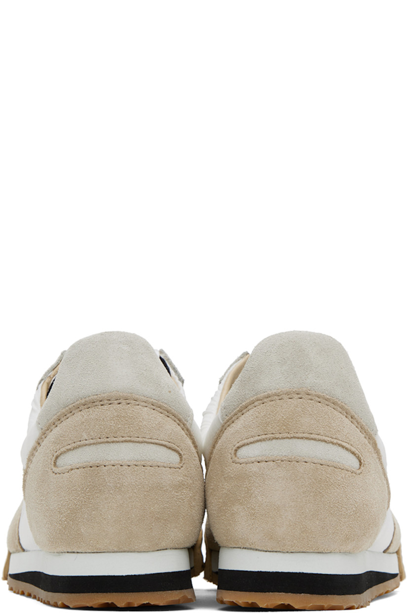 Low-top paneled suede, nappa calfskin, and mesh sneakers in white and beige.

· Crepe rubber trim at toe
· Lace-up closure
· Textile logo patch at padded tongue
· Padded collar
· Buffed calfskin and mesh lining
· Foam rubber midsole
· Treaded rubber outsole

Supplier color: Ivory