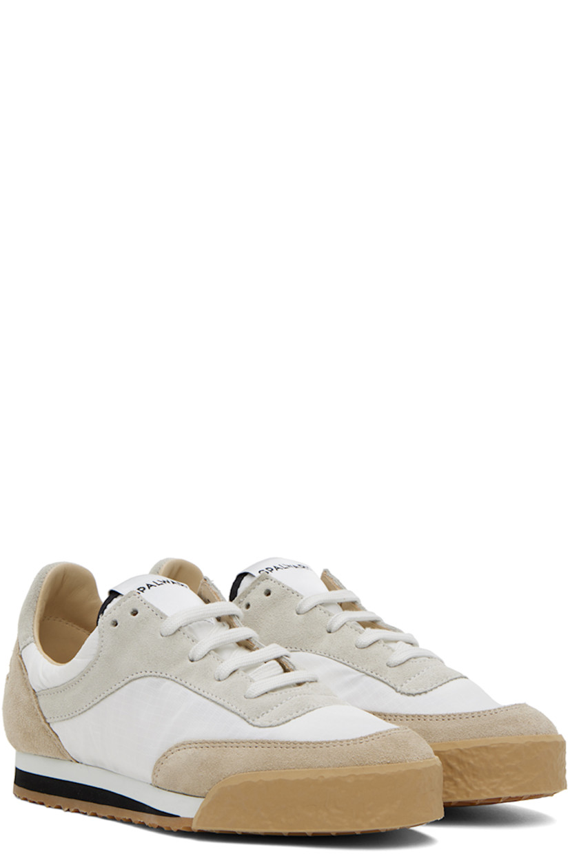 Low-top paneled suede, nappa calfskin, and mesh sneakers in white and beige.

· Crepe rubber trim at toe
· Lace-up closure
· Textile logo patch at padded tongue
· Padded collar
· Buffed calfskin and mesh lining
· Foam rubber midsole
· Treaded rubber outsole

Supplier color: Ivory