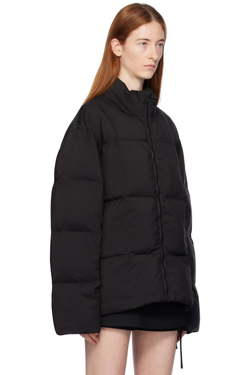 Insulated quilted polyester taffeta jacket. 

· Stand collar 
· Zip closure 
· Zip pockets 
· Logo patch at front hem 
· Concealed bungee-style drawstring at hem 
· Full satin lining
· Logo-engraved black hardware

Supplier color: Black