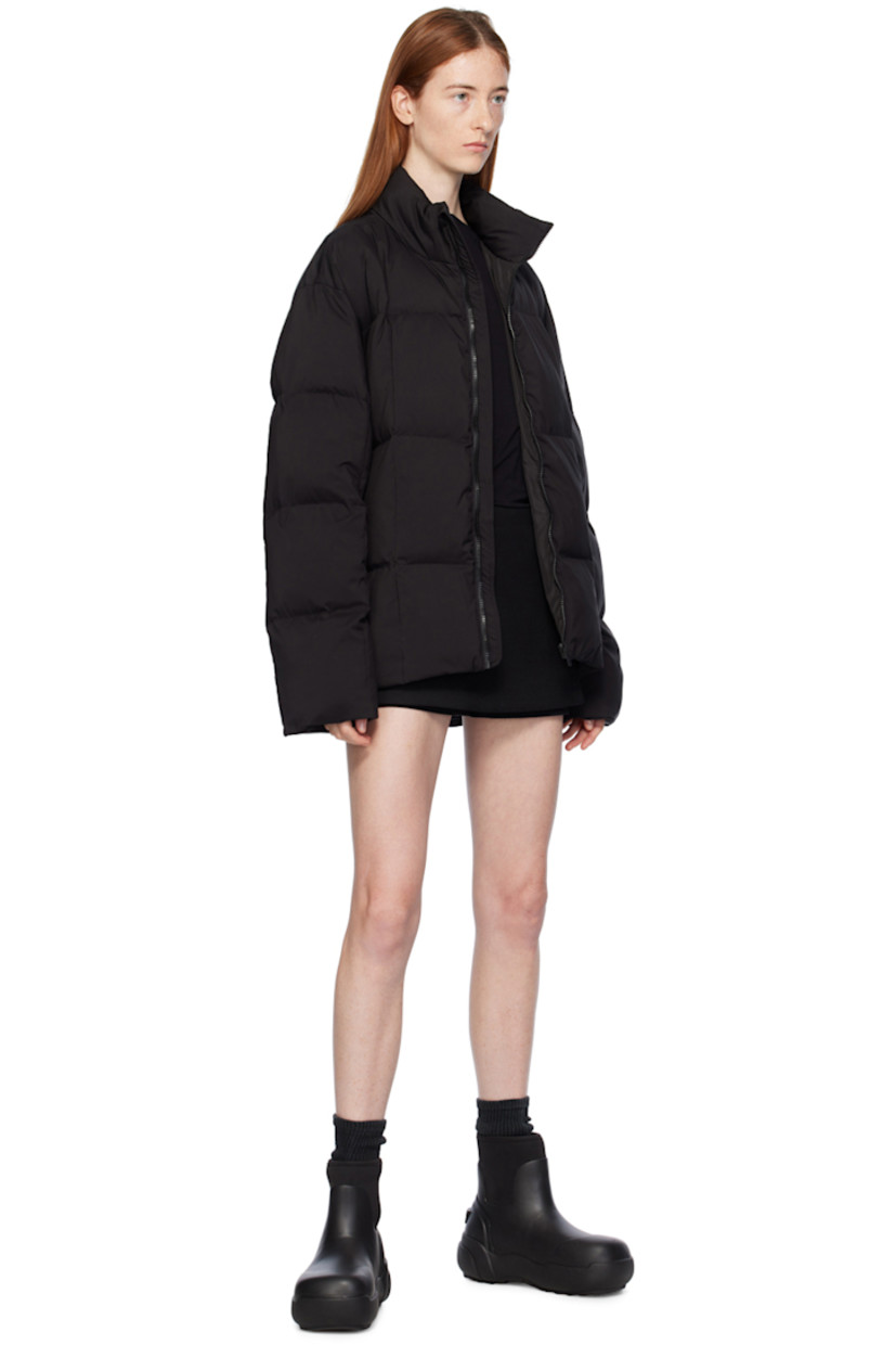 Insulated quilted polyester taffeta jacket. 

· Stand collar 
· Zip closure 
· Zip pockets 
· Logo patch at front hem 
· Concealed bungee-style drawstring at hem 
· Full satin lining
· Logo-engraved black hardware

Supplier color: Black