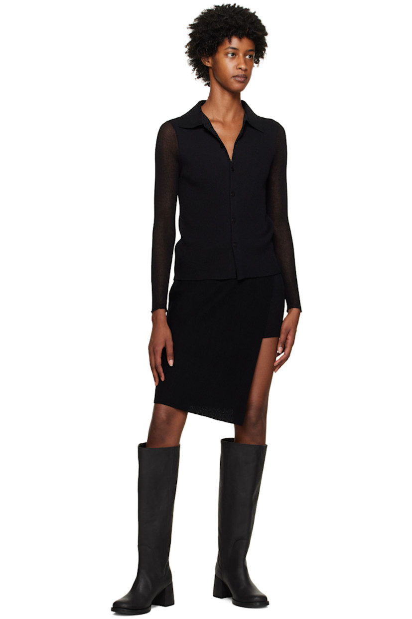 Knee-high buffed leather boots in black.

· Grained leather lining
· Covered block heel with rubber injection
· Rubber sole
· Heel: H2 in

Supplier color: Black leather