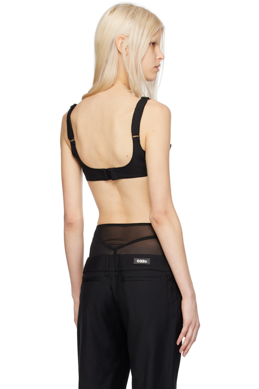 Bonded wool jersey bralette.

· Square neck
· Cutout and logo hardware at front
· Adjustable shoulder straps
· Hook-eye fastening at back
· Full twill lining

Supplier color: Black