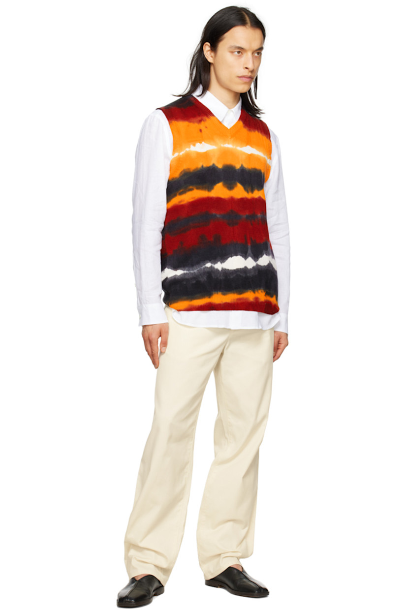 Knit cashmere vest. 

· Tie-dyed pattern throughout  
· Rib knit V-neck, hem and  armscyes

Each item is unique. Please note that coloration may vary.

Supplier color: Fire tie dye