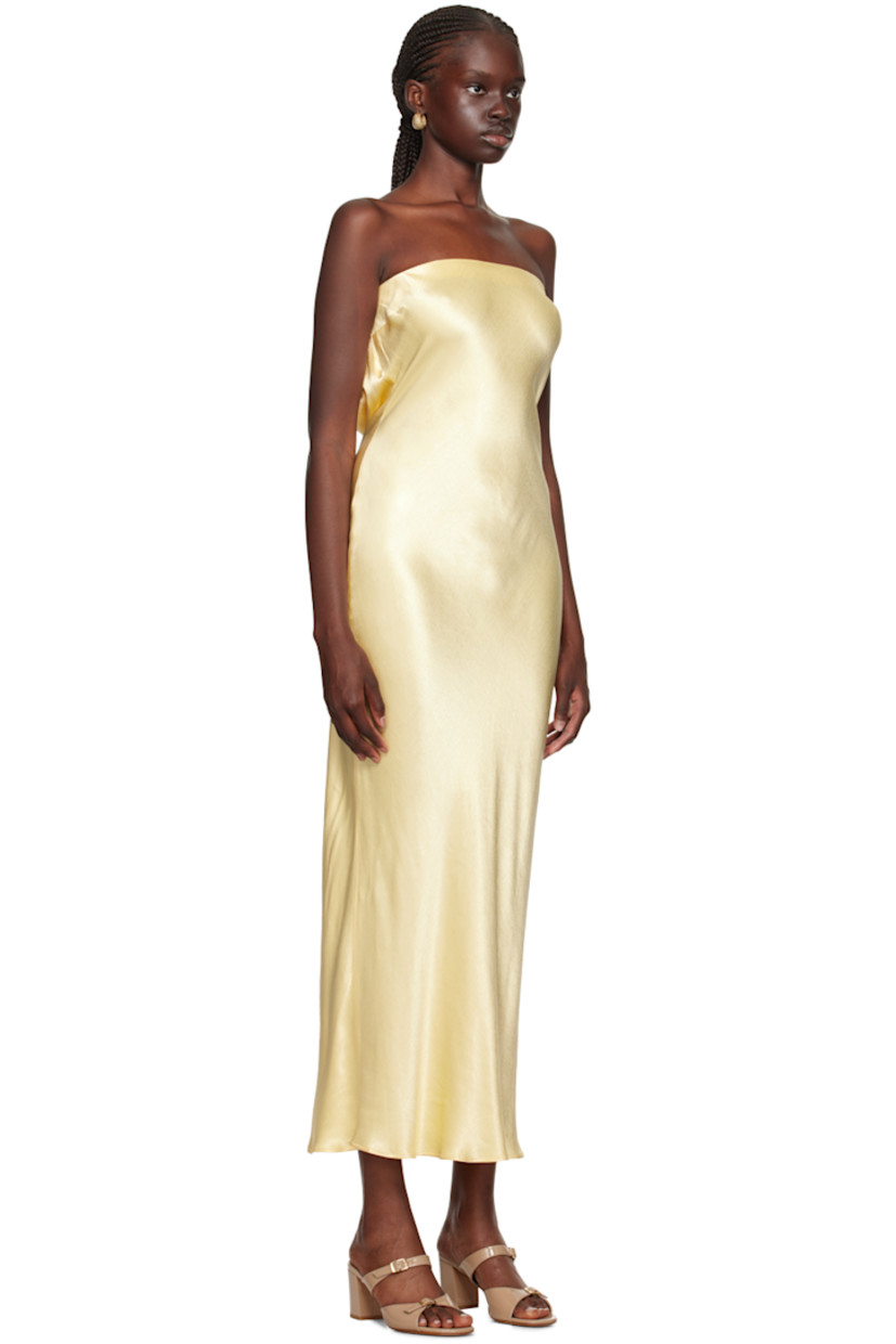 Bias-cut viscose hammered satin dress.

· Strapless construction
· Elasticized straight neck
· Darts at chest
· Hook-eye fastening at back
· Draping at low back 

Supplier color: Butter yellow