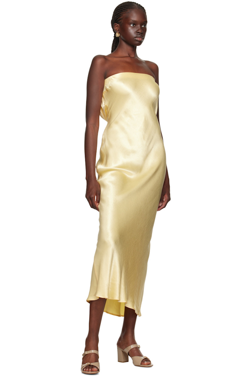Bias-cut viscose hammered satin dress.

· Strapless construction
· Elasticized straight neck
· Darts at chest
· Hook-eye fastening at back
· Draping at low back 

Supplier color: Butter yellow