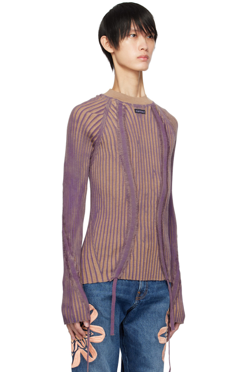 Hand-painted rib knit merino wool sweater. Drawstrings and laddering throughout.

· Mock neck
· Logo patch at collar
· Raglan sleeves

Supplier color: Beige