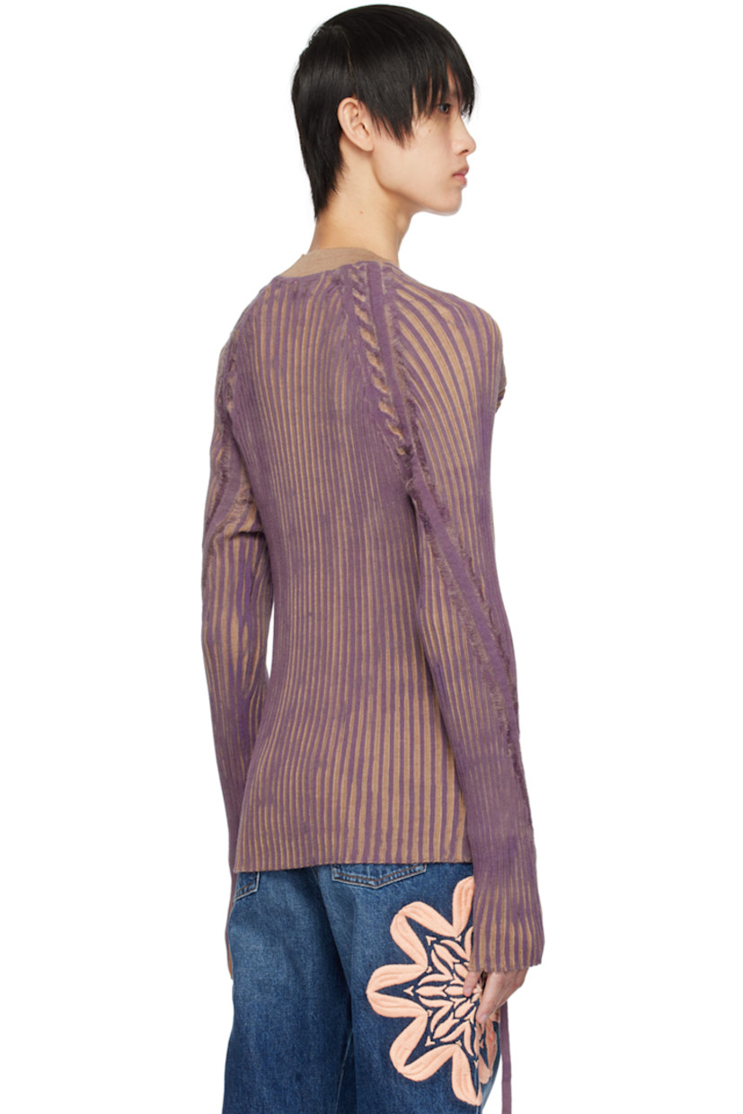 Hand-painted rib knit merino wool sweater. Drawstrings and laddering throughout.

· Mock neck
· Logo patch at collar
· Raglan sleeves

Supplier color: Beige