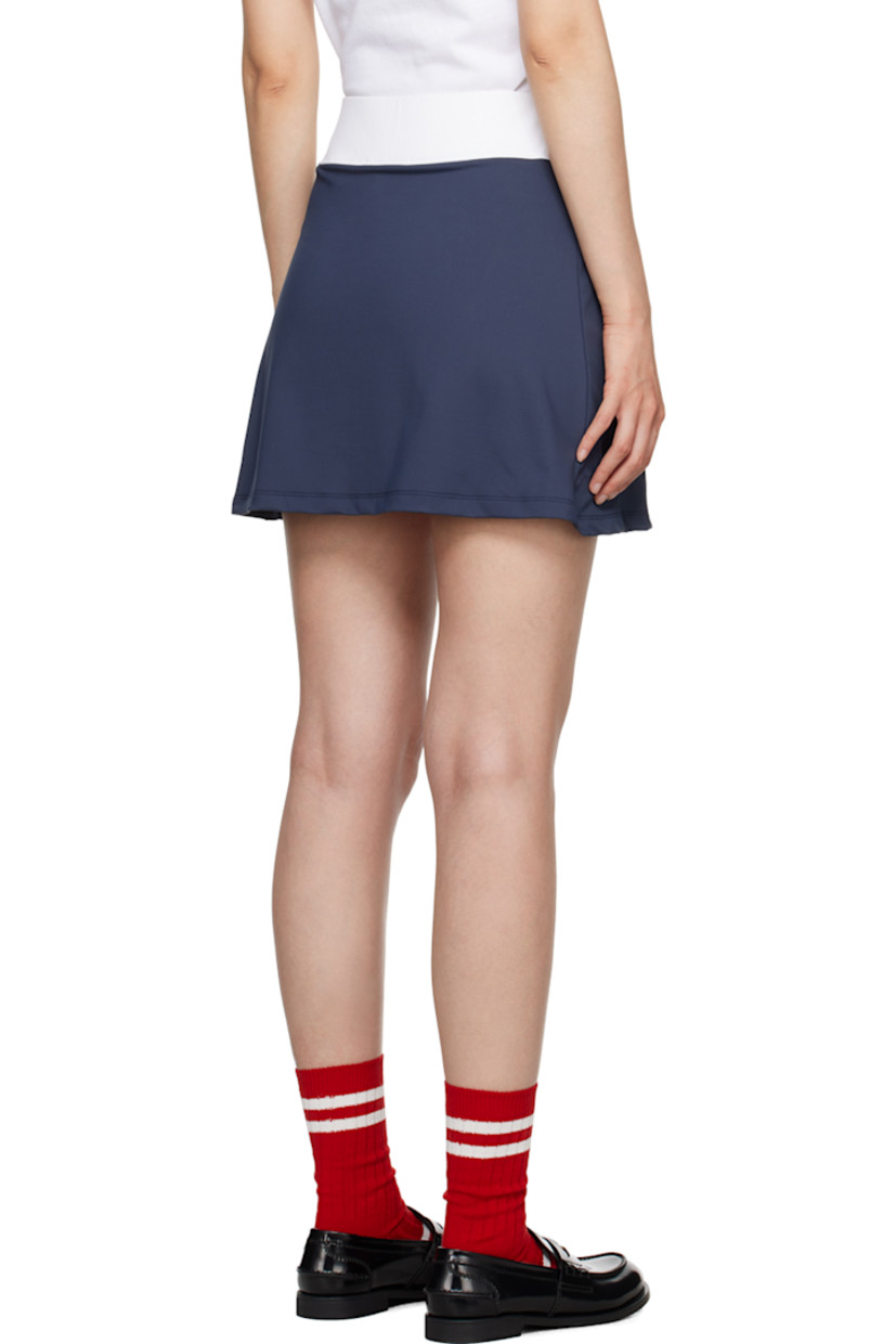 Stretch nylon jersey skort.

· Elasticized waistband
· Inverted pleats at front
· Logo and graphic embroidered at side seams

Available exclusively at SSENSE.

Supplier color: Navy
