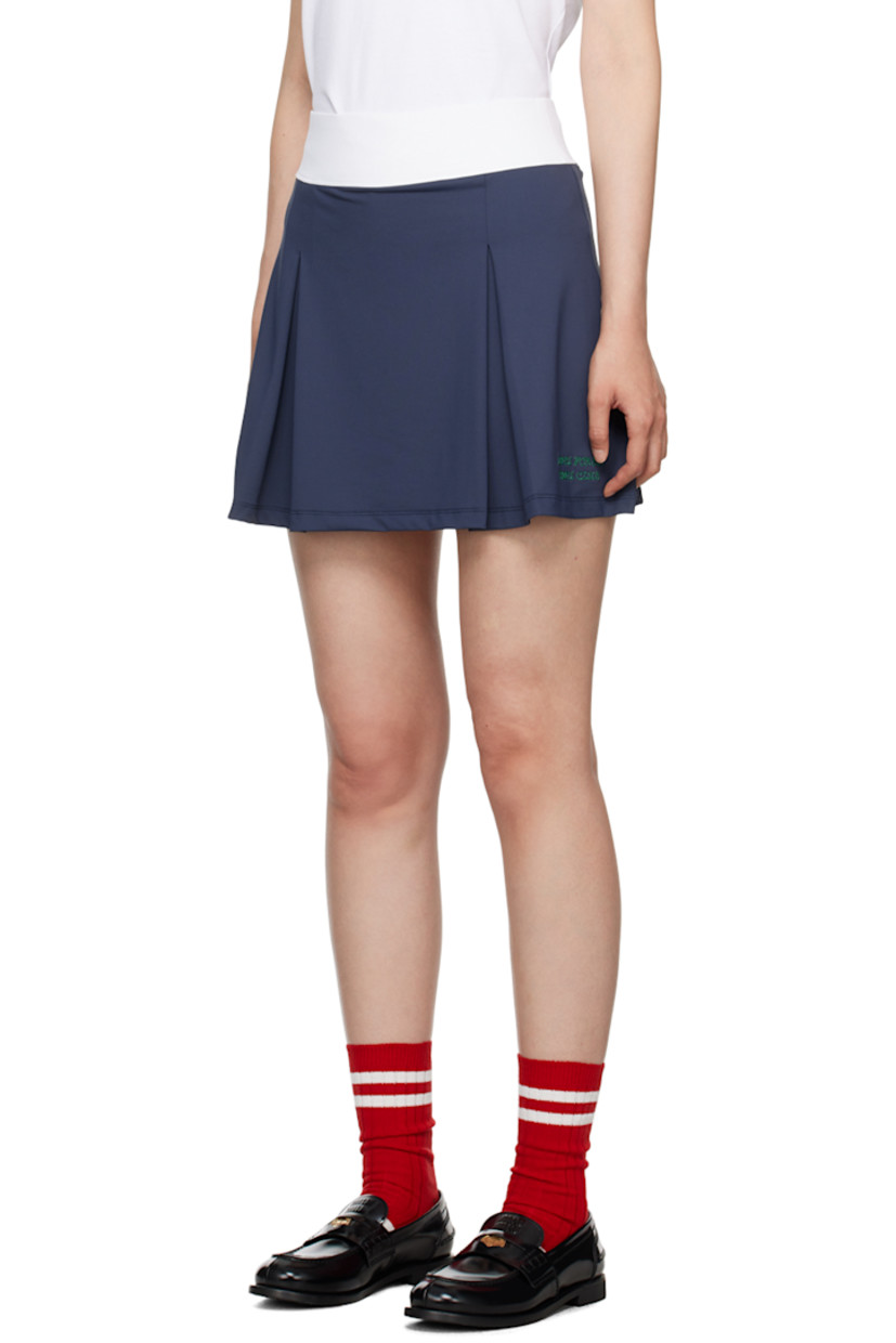 Stretch nylon jersey skort.

· Elasticized waistband
· Inverted pleats at front
· Logo and graphic embroidered at side seams

Available exclusively at SSENSE.

Supplier color: Navy