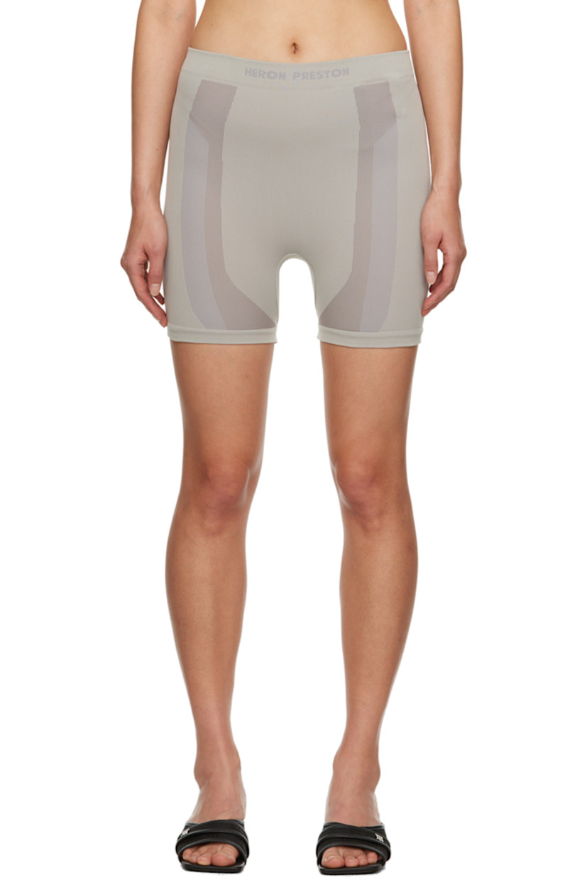 Stretch nylon jersey shorts. Jacquard graphic pattern throughout. 

�· Intarsia logo at elasticized waistband
· Rib knit cuffs
· Logo patches at back 

Supplier color: Beige light grey