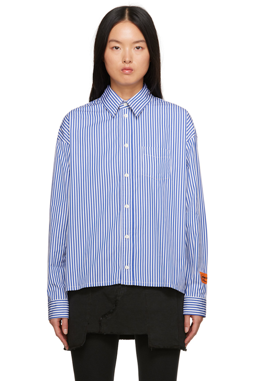 Cotton poplin shirt. Stripes throughout.

· Spread collar
· Button closure
· Patch pocket at chest
· Shirttail hem
· Single-button barrel cuffs
· Logo patch at cuff
· Graphic and text printed at back

Supplier color: Blue/Fuchsia