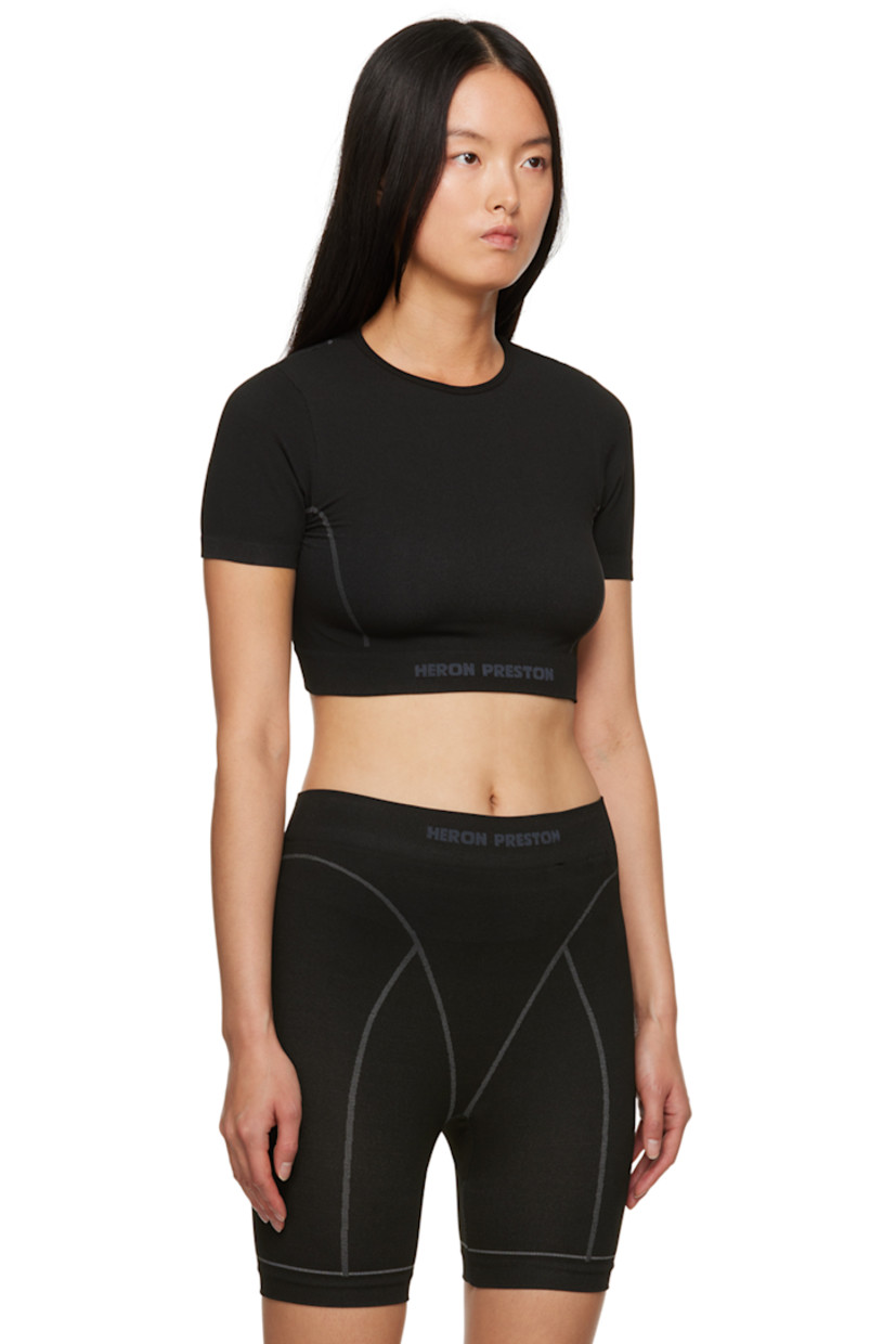 Stretch nylon jersey top. Garter stitch detailing throughout.

· Crewneck
· Intarsia logo at cropped elasticized hem
· Rib knit cuffs
· Logo patches at back collar

Supplier color: Black/White