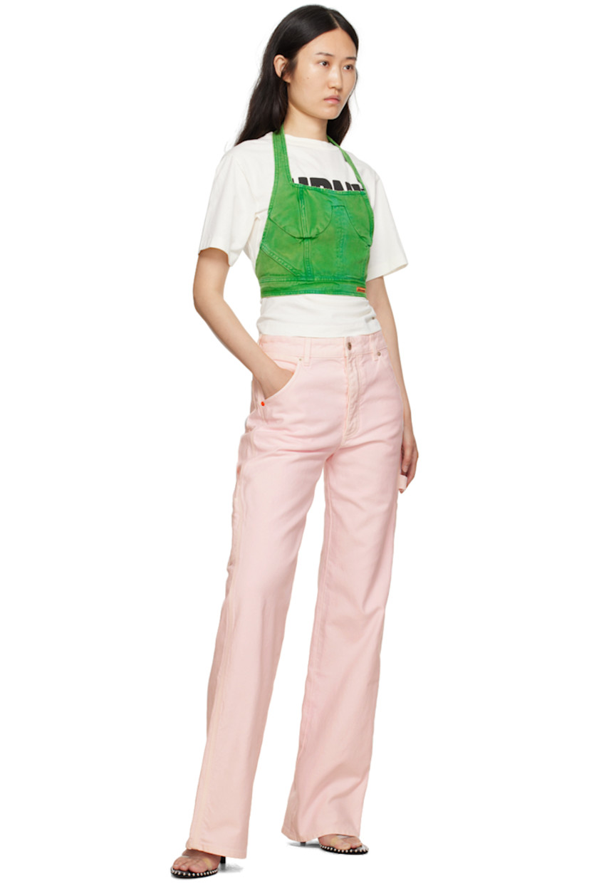 Cotton canvas corset-style tank top. Fading and subtle distressing throughout. 

· Paneled construction
· Square neck
· Logo patch at front cropped hem 
· Fixed halter strap
· Open back
· Adjustable pin-buckle strap at back hem
· Unlined

Supplier color: Green