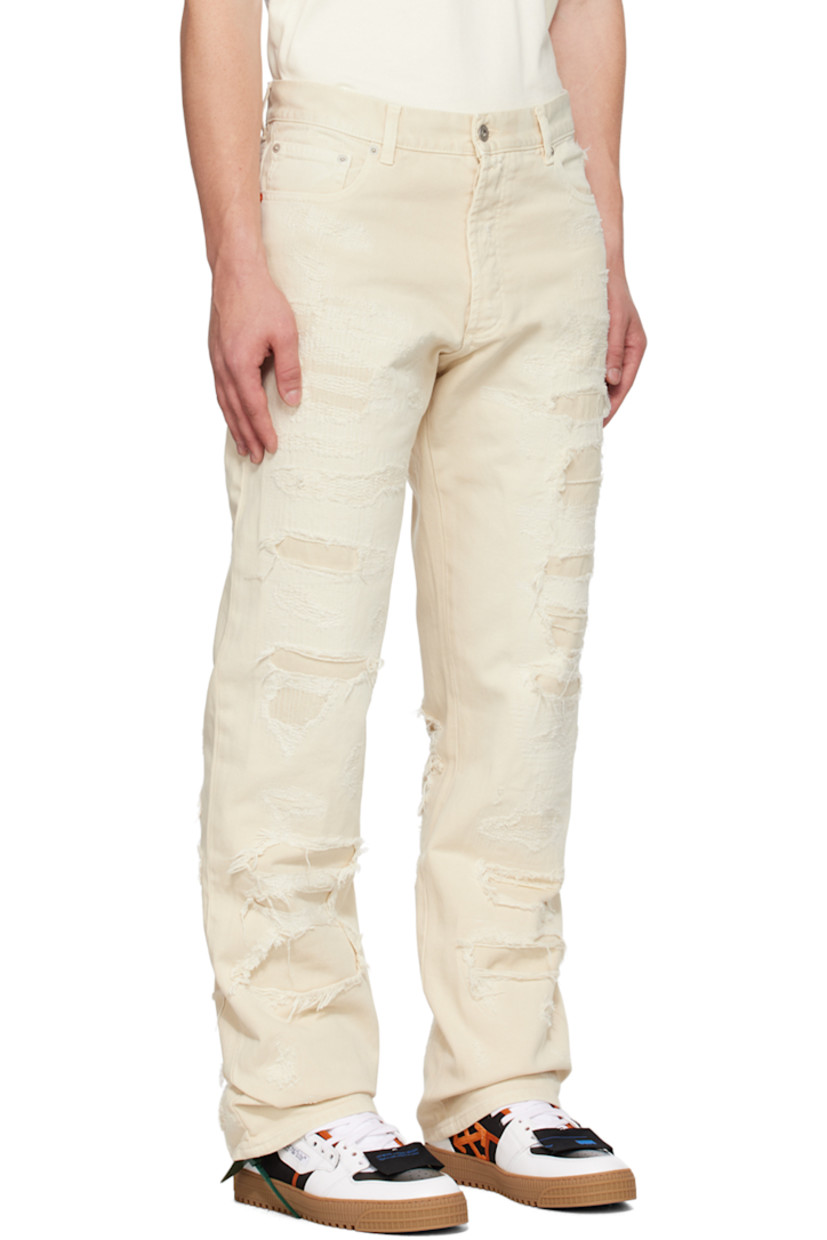 Straight-leg non-stretch denim jeans. Distressing, topstitching, and underlays throughout. 

· Paneled construction 
· Belt loops
· Button-fly
· Five-pocket styling
· Leather logo patch at back waistband
· Logo-engraved silver-tone hardware

Supplier color: Ivory