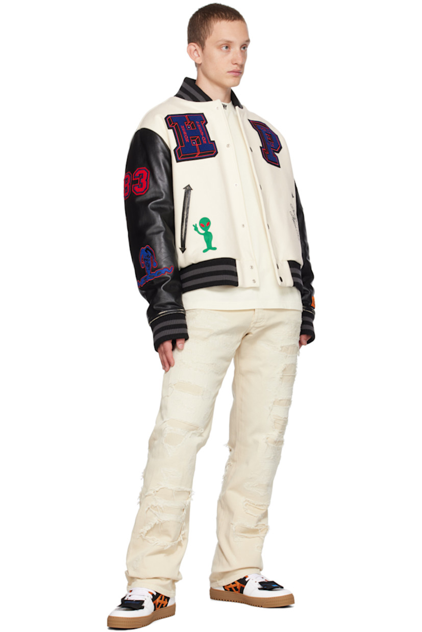 Straight-leg non-stretch denim jeans. Distressing, topstitching, and underlays throughout. 

· Paneled construction 
· Belt loops
· Button-fly
· Five-pocket styling
· Leather logo patch at back waistband
· Logo-engraved silver-tone hardware

Supplier color: Ivory